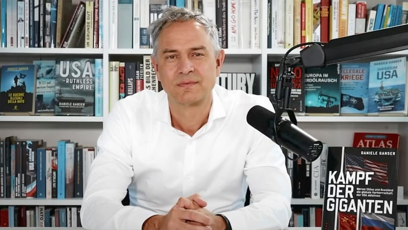 Im Gespräch: Dr. Daniele Ganser | "Kampf der Giganten – Warum China und Russland die globale Vorherrschaft der USA ablehnen" Beitragsbild